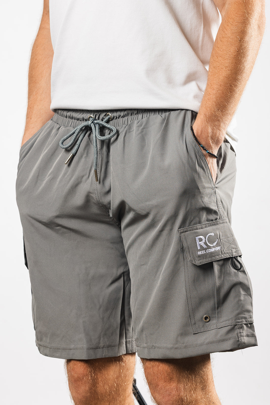 Man with hands in Gray Padded Men's Fishing Shorts